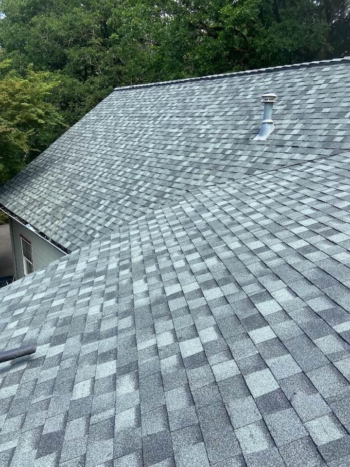 Completed architectural shingle roof by Central Roofing Pro